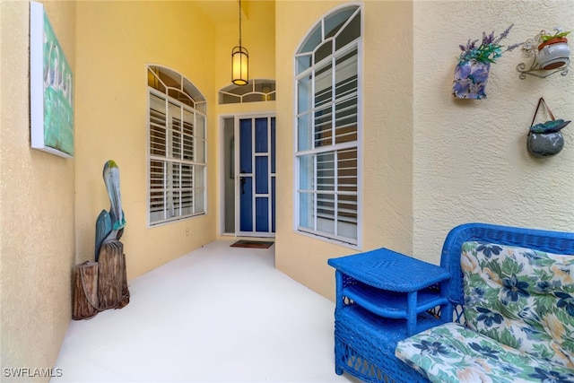 doorway to property with a patio