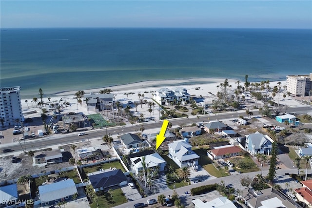 aerial view with a water view and a view of the beach