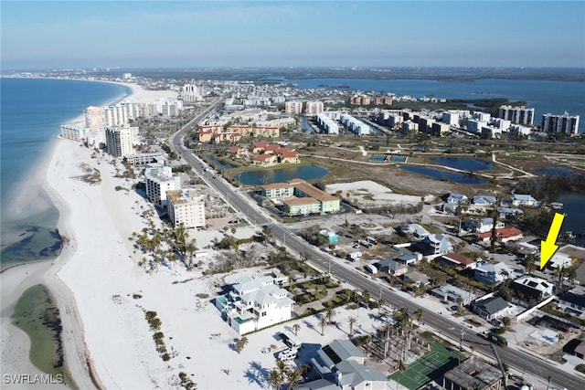 aerial view with a view of the beach and a water view