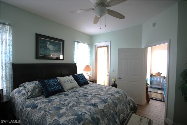 bedroom featuring hardwood / wood-style flooring and ceiling fan