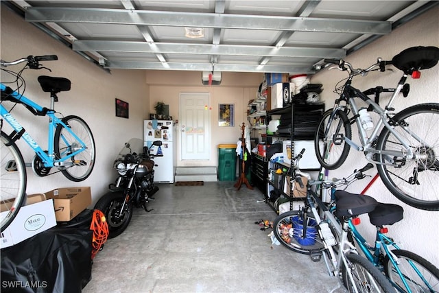 garage featuring white refrigerator