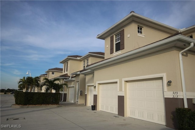 view of front of property with a garage