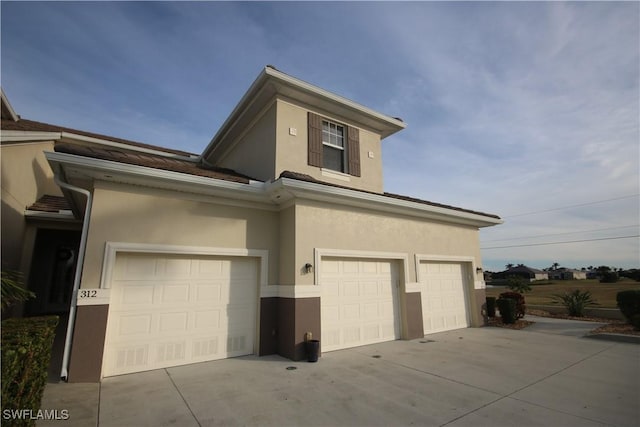 view of home's exterior with a garage