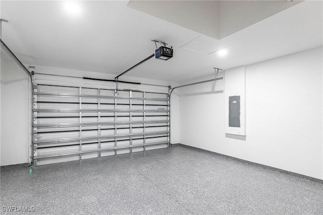 garage featuring a garage door opener and electric panel