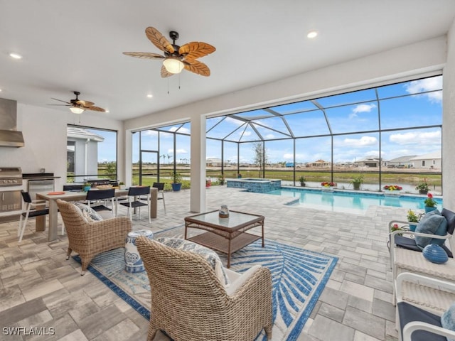 view of patio / terrace with area for grilling, a swimming pool with hot tub, outdoor lounge area, and glass enclosure