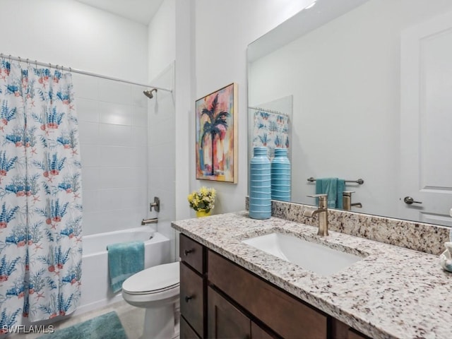 full bathroom with vanity, toilet, and shower / bath combo