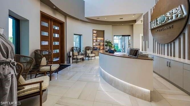15745 Cortina St, Naples, FL 34114 - welcome area featuring a high ceiling and recessed lighting