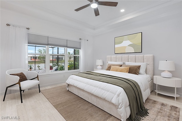 15745 Cortina St, Naples, FL 34114 - bedroom featuring ornamental molding, baseboards, wood finished floors, a raised ceiling, and recessed lighting