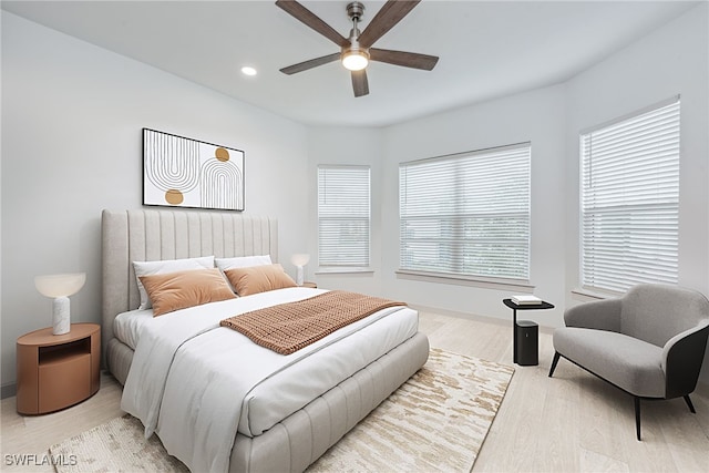 15745 Cortina St, Naples, FL 34114 - bedroom with light wood-style flooring, recessed lighting, baseboards, and ceiling fan