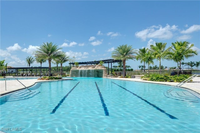 view of swimming pool featuring pool water feature