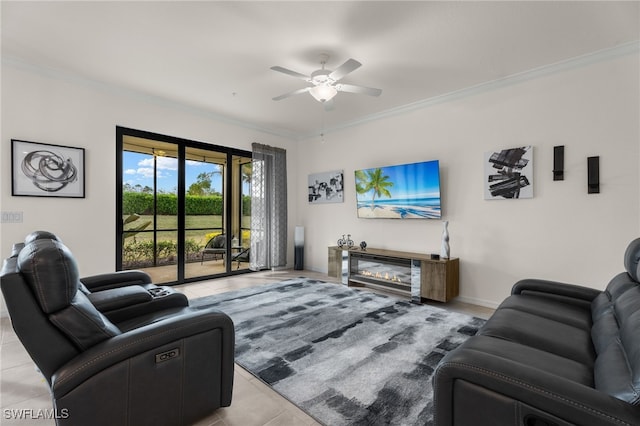 living room with ceiling fan, crown molding, and light tile patterned flooring