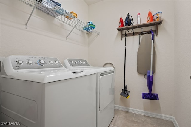 laundry room featuring washing machine and dryer