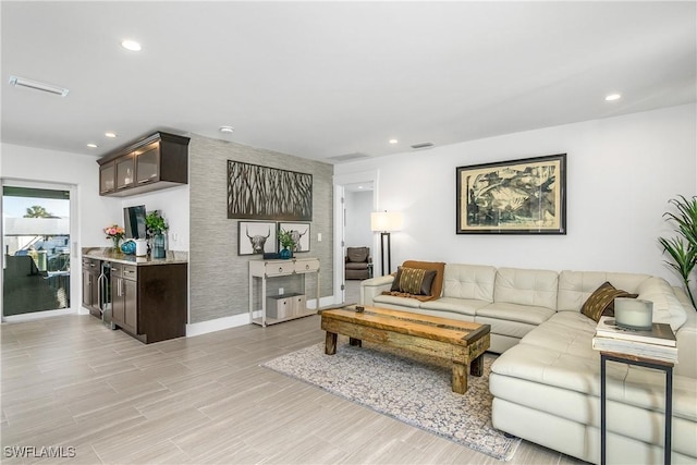 living room with light hardwood / wood-style floors