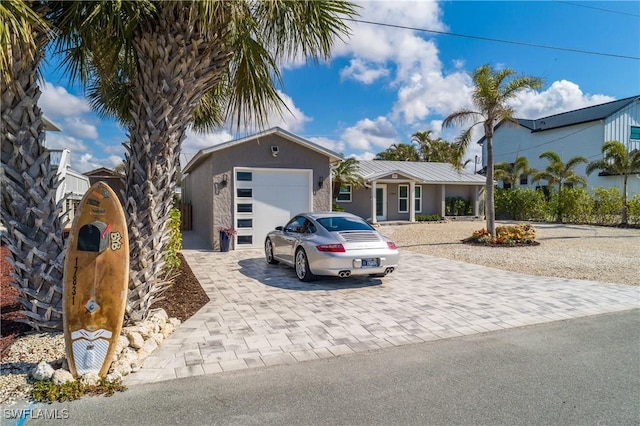 view of front of home featuring a garage