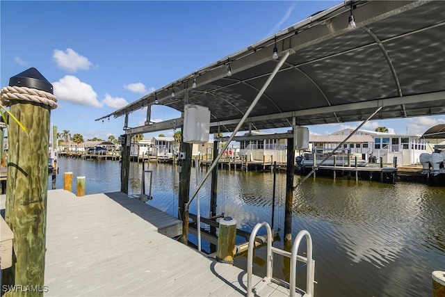 dock area featuring a water view