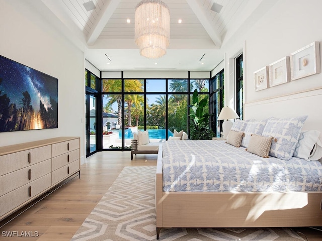 bedroom featuring a wall of windows, access to outside, wooden ceiling, light hardwood / wood-style flooring, and beam ceiling