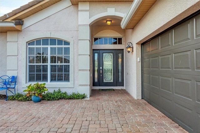 entrance to property with a garage