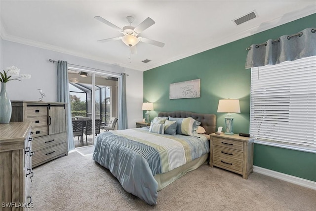 carpeted bedroom featuring access to outside, ornamental molding, and ceiling fan