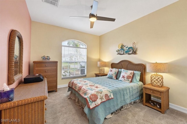 bedroom with light colored carpet and ceiling fan