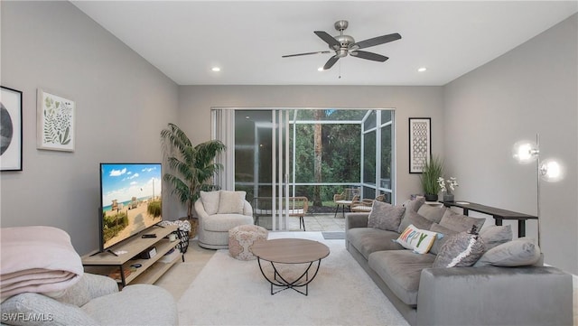 tiled living room featuring ceiling fan