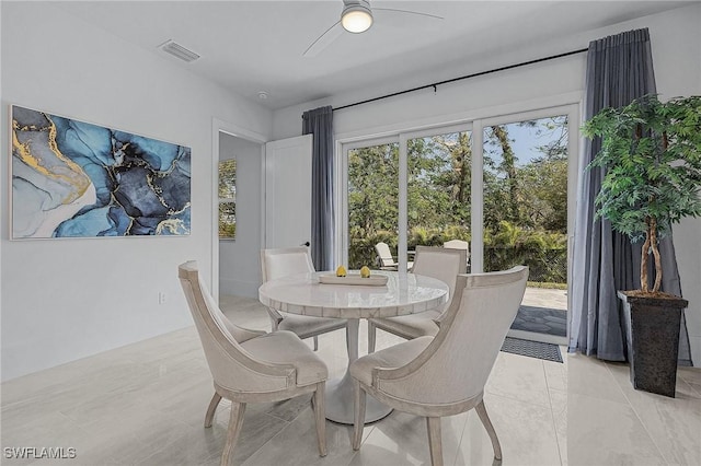 dining room featuring ceiling fan