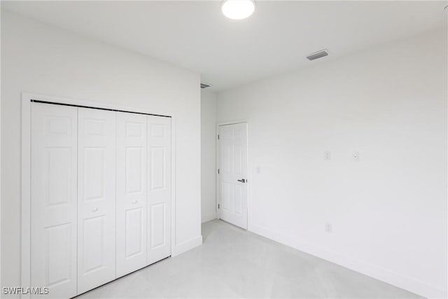 unfurnished bedroom featuring a closet