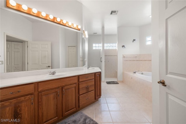 bathroom with tile patterned floors, vanity, and plus walk in shower