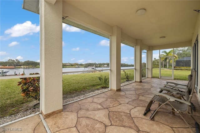 sunroom with a water view