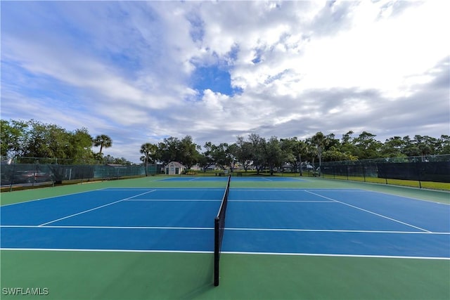 view of tennis court with basketball court