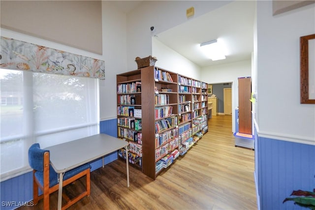 living area with hardwood / wood-style floors