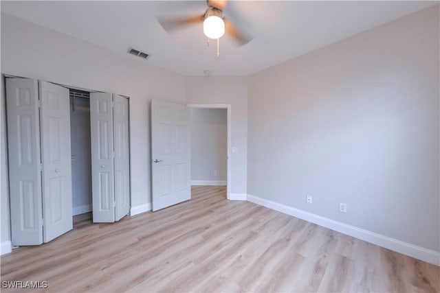 unfurnished bedroom featuring ceiling fan and light hardwood / wood-style floors