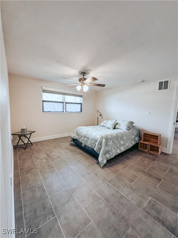 bedroom featuring ceiling fan