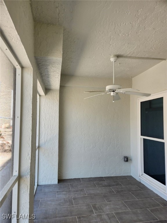 view of patio with ceiling fan