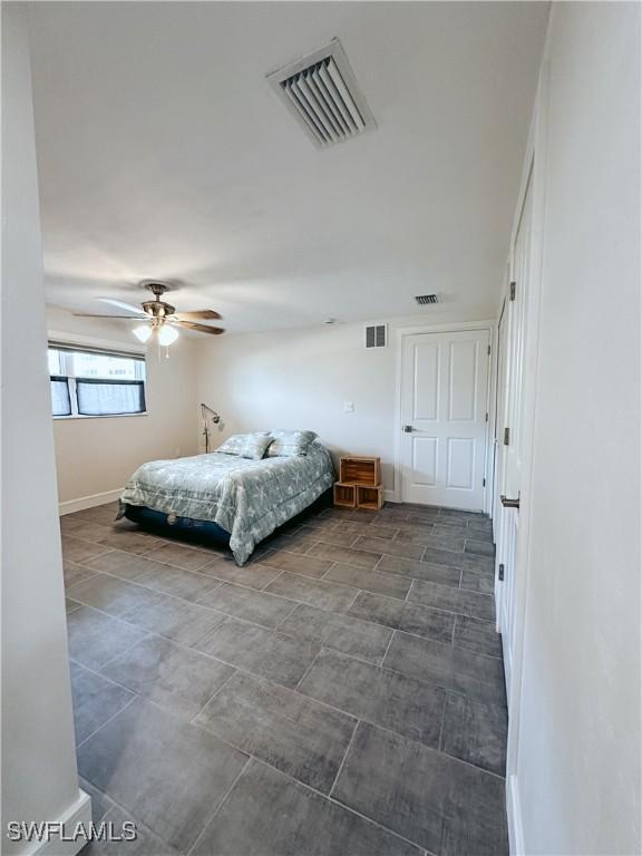 bedroom featuring ceiling fan