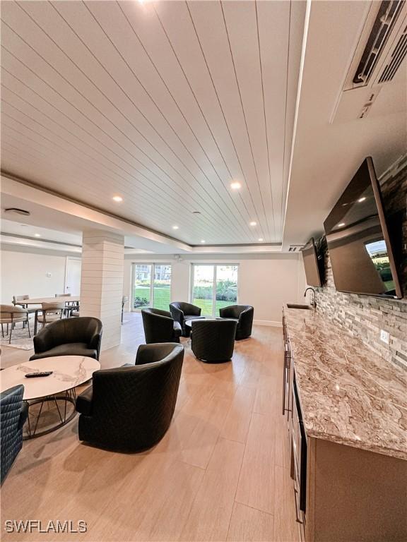 25740 Hickory Blvd Unit 142, Bonita Springs, FL 34134 - living room featuring visible vents, ornate columns, and recessed lighting