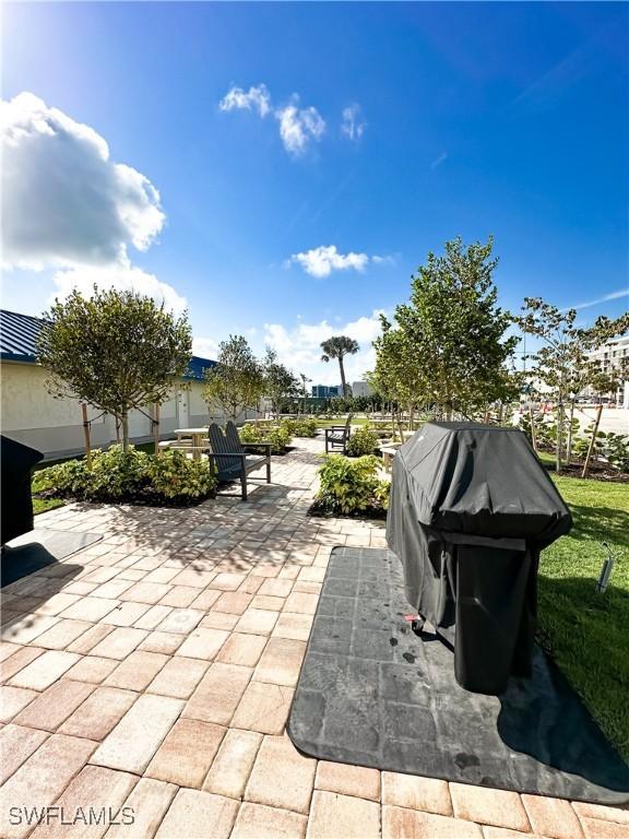 25740 Hickory Blvd Unit 142, Bonita Springs, FL 34134 - view of patio featuring area for grilling