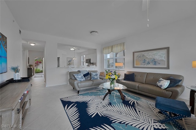 living room with light tile patterned flooring