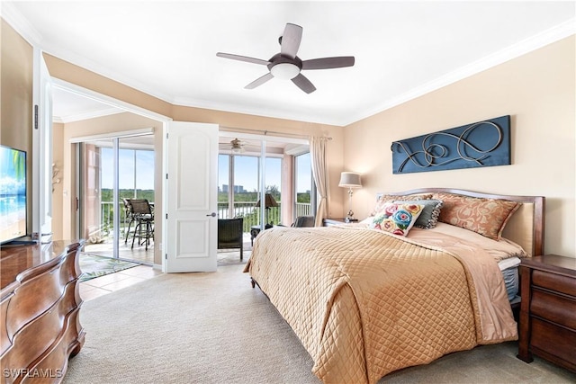 carpeted bedroom with ceiling fan, access to exterior, and crown molding