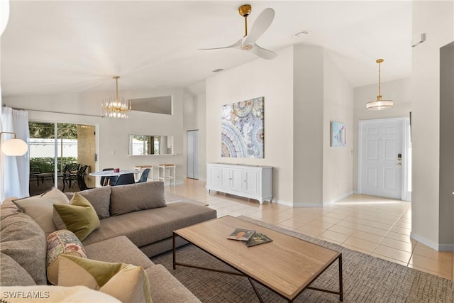 living room featuring ceiling fan with notable chandelier, high vaulted ceiling, and light tile patterned floors