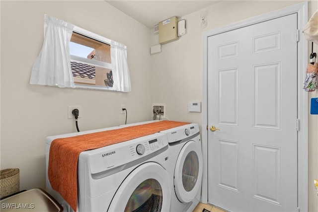 laundry area with washer and dryer