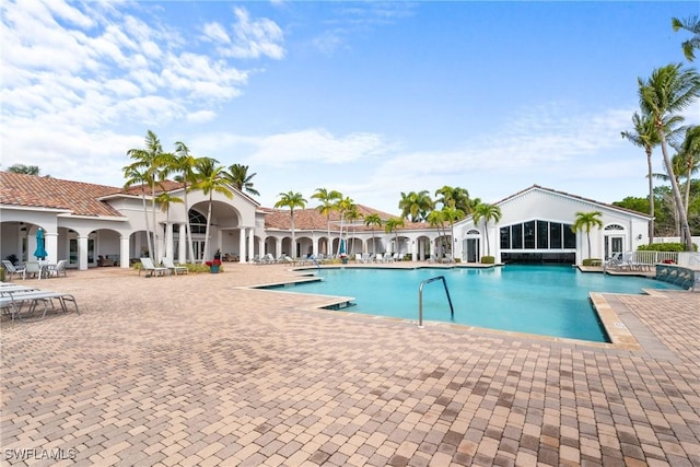 pool featuring a patio area