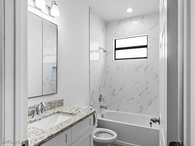 full bathroom featuring toilet, vanity, and shower / bath combination