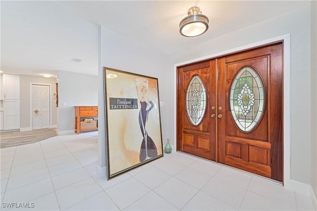 view of tiled entrance foyer