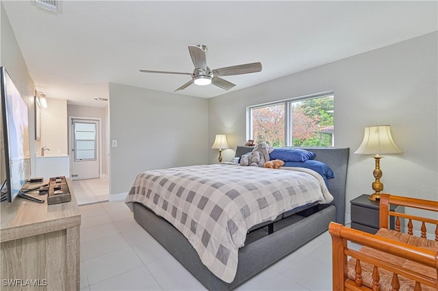 tiled bedroom with ceiling fan