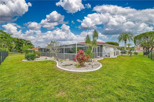 view of yard with a lanai