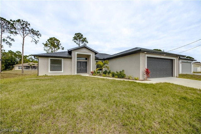 single story home with a garage and a front lawn