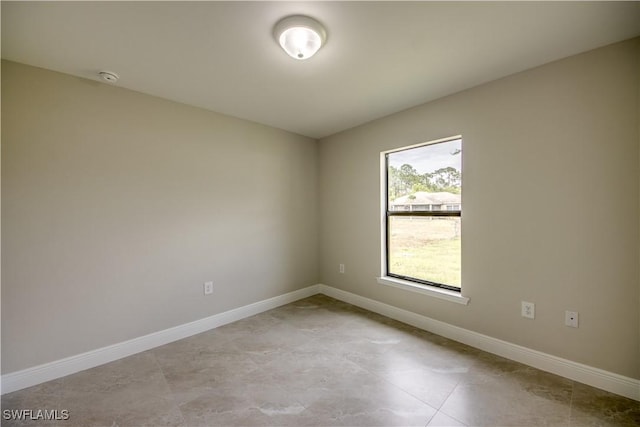 view of tiled spare room