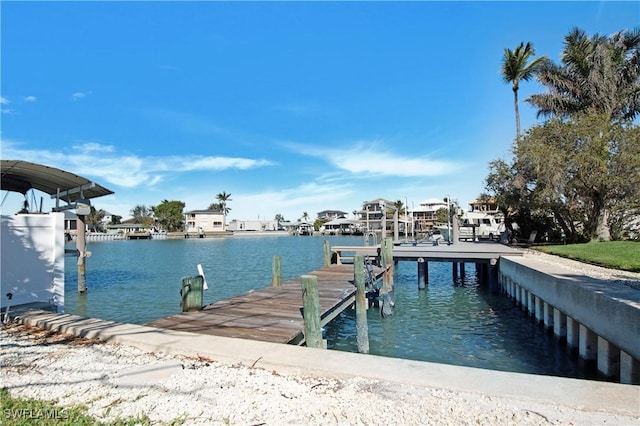 view of dock with a water view