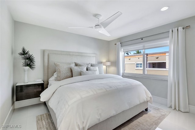 bedroom featuring ceiling fan and light tile patterned floors