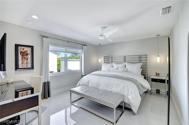 bedroom featuring light tile patterned flooring and ceiling fan